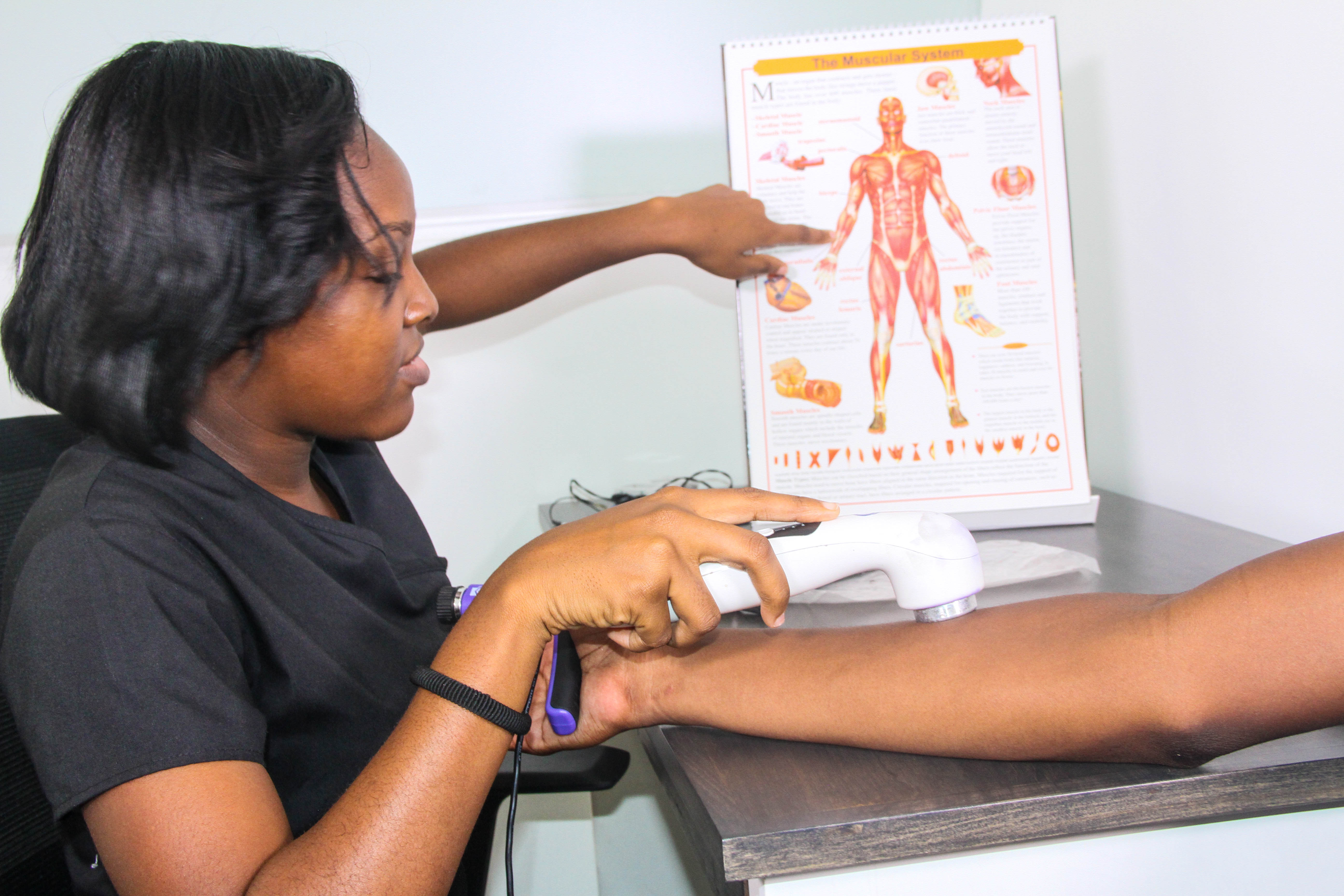 Felesia Laing explains treatment to patient